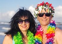 Surfside beach: photo of croatians in Hawaiian ornaments